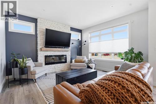 250 Skopik Crescent, Saskatoon, SK - Indoor Photo Showing Living Room With Fireplace
