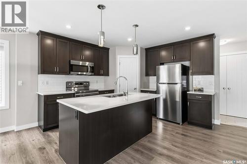 139 Dagnone Lane, Saskatoon, SK - Indoor Photo Showing Kitchen With Double Sink With Upgraded Kitchen