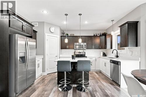 575 Childers Crescent, Saskatoon, SK - Indoor Photo Showing Kitchen With Stainless Steel Kitchen With Upgraded Kitchen