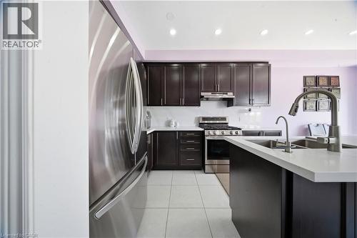 166 Deerpath Drive Unit# 32, Guelph, ON - Indoor Photo Showing Kitchen With Stainless Steel Kitchen With Double Sink With Upgraded Kitchen