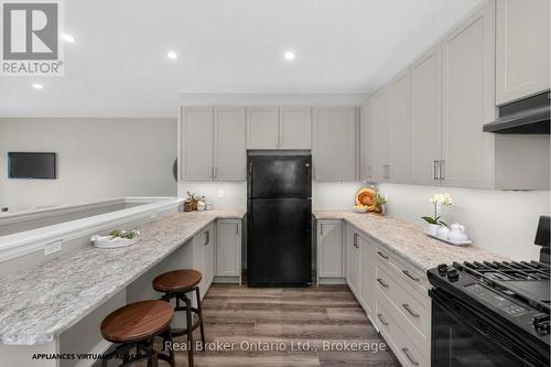 90 14 Concession E, Tiny, ON - Indoor Photo Showing Kitchen With Upgraded Kitchen