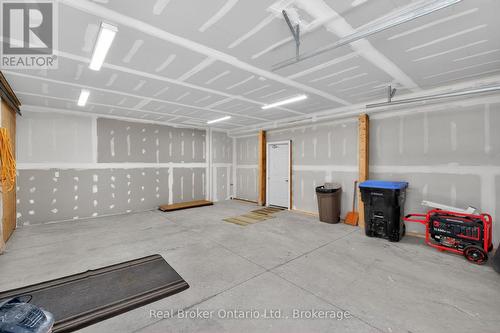 90 14 Concession E, Tiny, ON - Indoor Photo Showing Garage