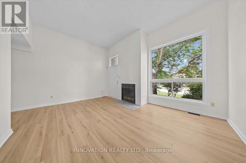 2 - 76 Esterlawn Private, Ottawa, ON - Indoor With Fireplace