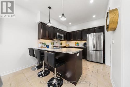 functional layour in kitchen with breakfast bar. - 152 Mcdonald Crescent, Clarington, ON - Indoor Photo Showing Kitchen