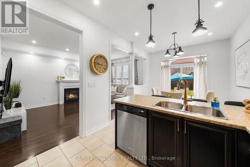 152 Mcdonald Crescent, Clarington, ON - Indoor Photo Showing Kitchen With Fireplace With Double Sink