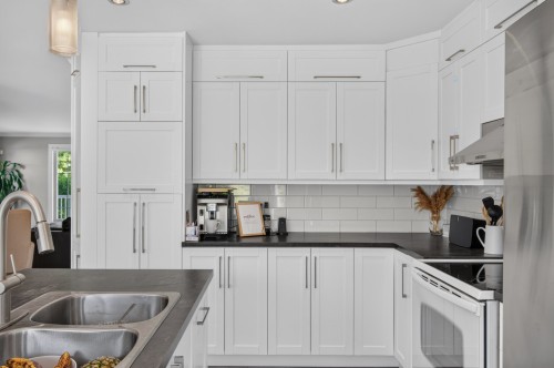 Cuisine - 79 Rue De Gatineau, Blainville, QC - Indoor Photo Showing Kitchen With Double Sink