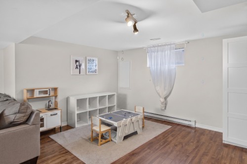 Salle familiale - 79 Rue De Gatineau, Blainville, QC - Indoor Photo Showing Other Room