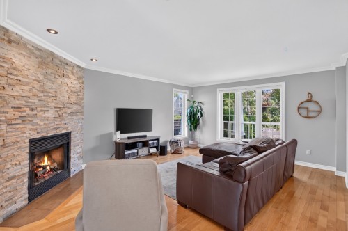 Salon - 79 Rue De Gatineau, Blainville, QC - Indoor Photo Showing Living Room With Fireplace