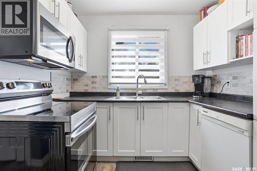 214 Michener Crescent, Saskatoon, SK - Indoor Photo Showing Kitchen With Double Sink