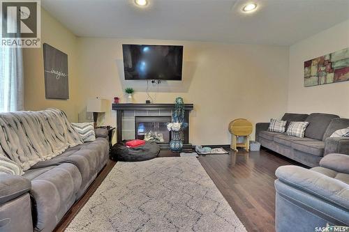 71 Fairway Crescent, White City, SK - Indoor Photo Showing Living Room With Fireplace