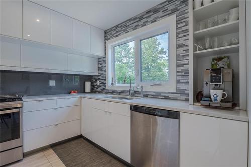 116 Harvest Drive, Steinbach, MB - Indoor Photo Showing Kitchen With Double Sink