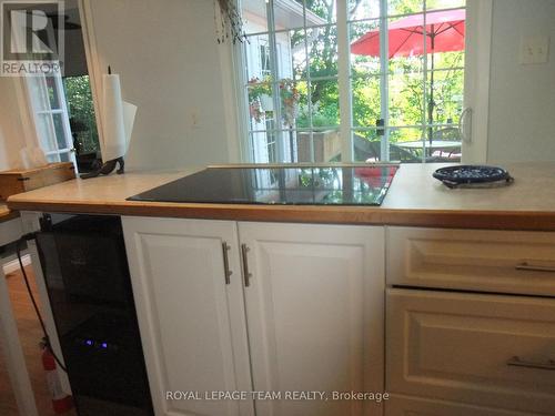 Induction stove top w/down draft vent. - 32 Gary Crescent, Arnprior, ON - Indoor Photo Showing Other Room