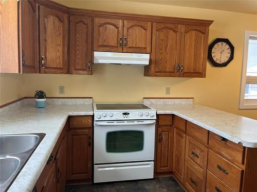 194 3Rd Avenue, Benito, MB - Indoor Photo Showing Kitchen With Double Sink