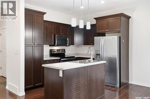2 115 Veltkamp Crescent, Saskatoon, SK - Indoor Photo Showing Kitchen With Double Sink With Upgraded Kitchen
