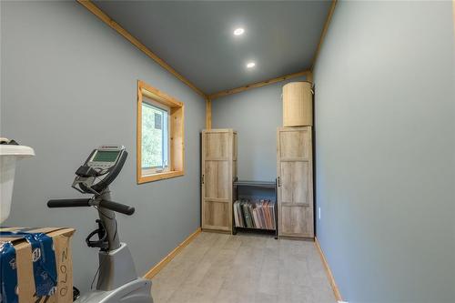 24 Wall Street, Zhoda, MB - Indoor Photo Showing Gym Room