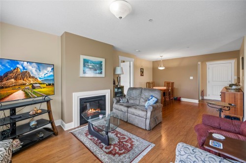 #308-1620 Townsite Rd, Nanaimo, BC - Indoor Photo Showing Living Room With Fireplace