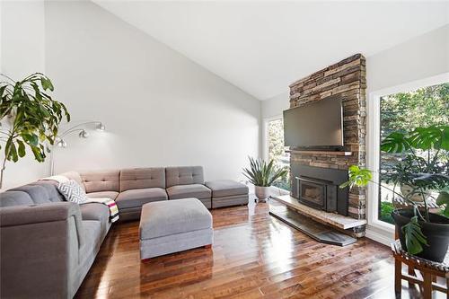 247 Augusta Dr, Winnipeg, MB - Indoor Photo Showing Living Room With Fireplace