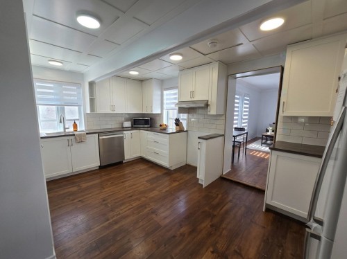Kitchen - 104 Rue St-Louis, Saint-Eustache, QC - Indoor Photo Showing Kitchen With Upgraded Kitchen