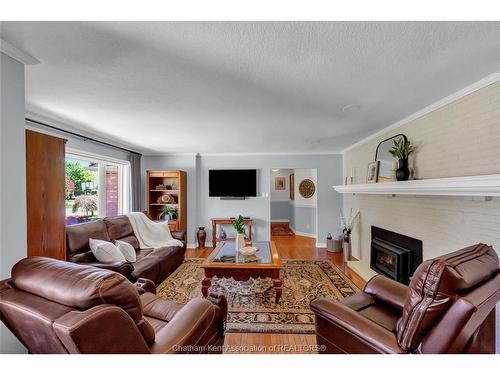 27 Cramar Crescent, Chatham, ON - Indoor Photo Showing Living Room With Fireplace