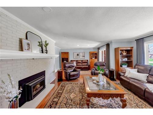 27 Cramar Crescent, Chatham, ON - Indoor Photo Showing Living Room With Fireplace
