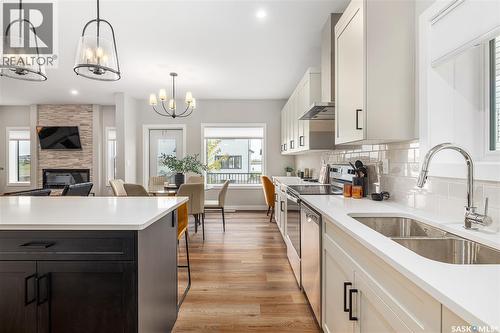 3012 Favel Drive, Regina, SK - Indoor Photo Showing Kitchen With Double Sink With Upgraded Kitchen