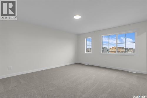 207 Amisk Way, Saskatoon, SK - Indoor Photo Showing Other Room