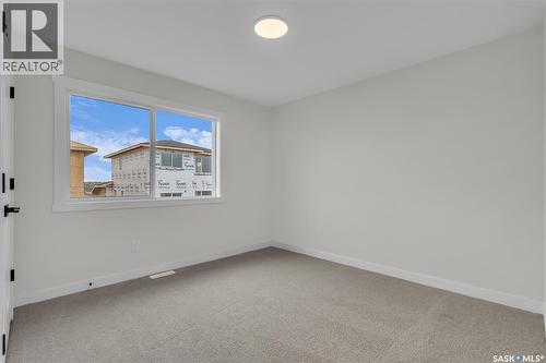 207 Amisk Way, Saskatoon, SK - Indoor Photo Showing Other Room