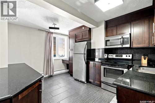 205 320 5Th Avenue N, Saskatoon, SK - Indoor Photo Showing Kitchen With Stainless Steel Kitchen