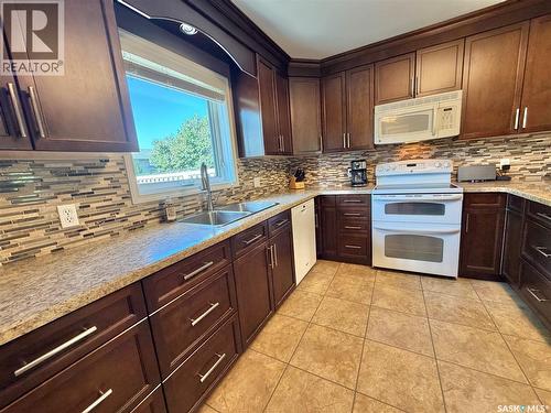 9 Gibson Bay, Yorkton, SK - Indoor Photo Showing Kitchen With Double Sink
