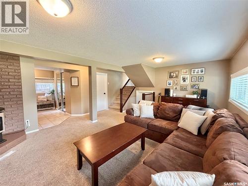 9 Gibson Bay, Yorkton, SK - Indoor Photo Showing Living Room With Fireplace