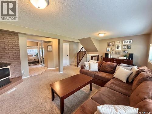 9 Gibson Bay, Yorkton, SK - Indoor Photo Showing Living Room With Fireplace