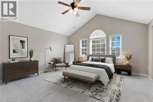 Vaulted ceiling with a ceiling fan and light fixture - 129 Kovac Road, Cambridge, ON - Indoor Photo Showing Bedroom