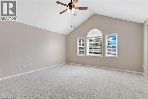 Vaulted ceiling with a ceiling fan light fixture - 129 Kovac Road, Cambridge, ON - Indoor Photo Showing Other Room