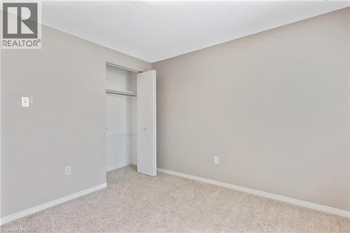Neutral-toned room with light gray walls and white trim - 129 Kovac Road, Cambridge, ON - Indoor Photo Showing Other Room