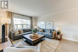 UPPER - 225 WOODVILLE AVENUE Toronto, ON M4J 2R4