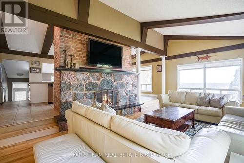 1787 Champlain Road, Tiny, ON - Indoor Photo Showing Living Room With Fireplace