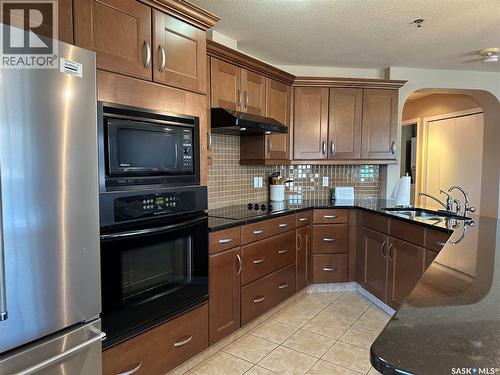 205 75 Souris Avenue, Weyburn, SK - Indoor Photo Showing Kitchen