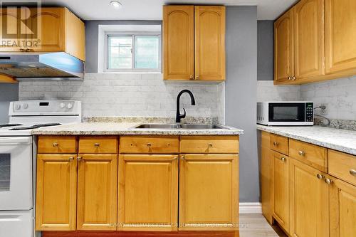 Basement - 33 Robbinstone Drive, Toronto, ON - Indoor Photo Showing Kitchen With Double Sink