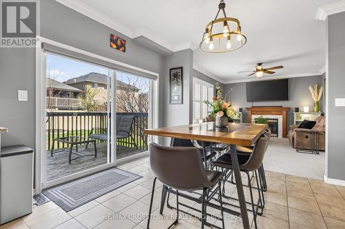 2197 Batters Loop, Innisfil, ON - Indoor Photo Showing Dining Room With Fireplace