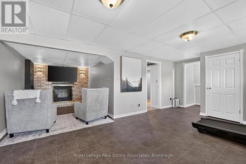 304 Eliza Street, Wellington North, ON - Indoor Photo Showing Other Room With Fireplace