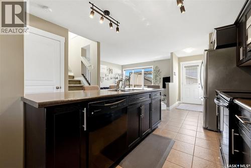 3326 Green Moss Lane, Regina, SK - Indoor Photo Showing Kitchen With Double Sink