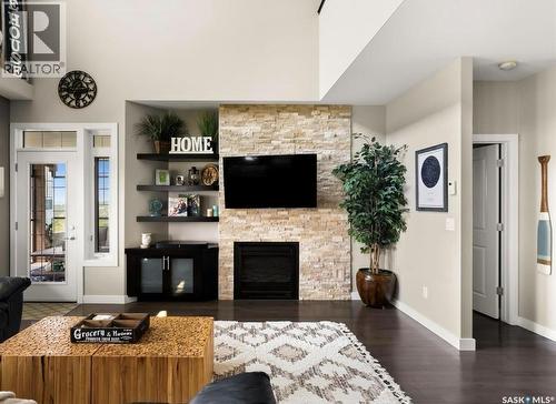 30 Shore Acres Drive, Last Mountain Lake, SK - Indoor Photo Showing Living Room With Fireplace