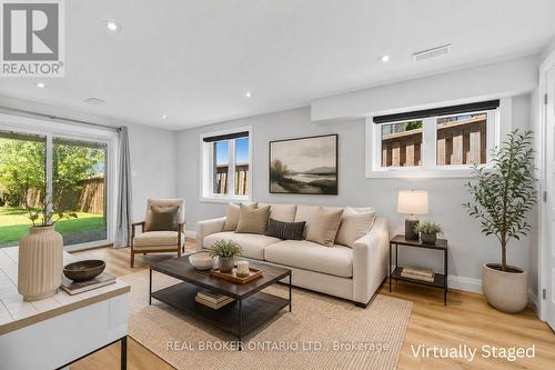 Virtual staged recreation room - 334 Blacksmith Way, Peterborough, ON - Indoor Photo Showing Living Room