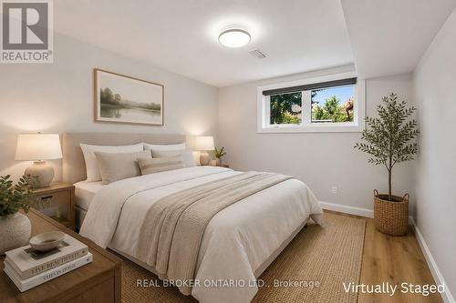 Virtual staged lower bedroom - 334 Blacksmith Way, Peterborough, ON - Indoor Photo Showing Bedroom