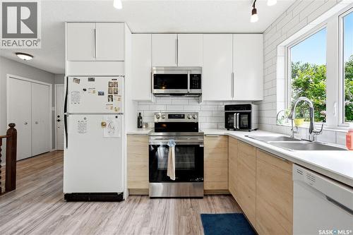 312 Ash Street, Outlook, SK - Indoor Photo Showing Kitchen With Double Sink
