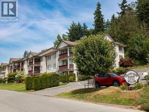 307-5700 Willow Ave, Powell River, BC - Outdoor With Balcony With Facade