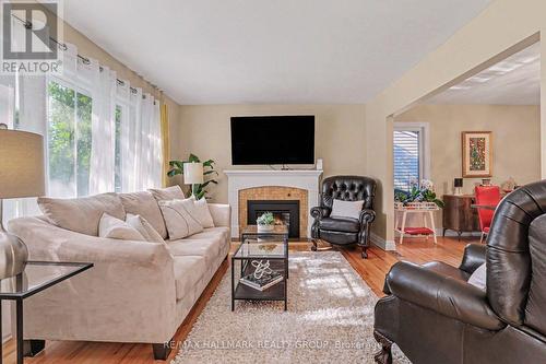 22 Dunvegan Road, Ottawa, ON - Indoor Photo Showing Living Room With Fireplace