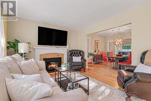 22 Dunvegan Road, Ottawa, ON - Indoor Photo Showing Living Room With Fireplace