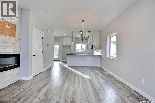 2956 Green Turtle Road, Regina, SK - Indoor With Fireplace