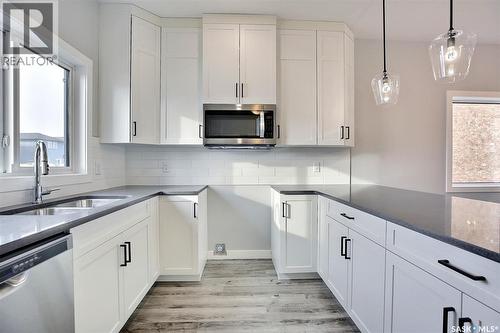 2956 Green Turtle Road, Regina, SK - Indoor Photo Showing Kitchen With Double Sink With Upgraded Kitchen
